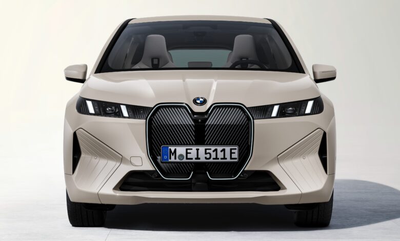 Front view of the facelifted BMW iX 2025 showcasing new headlights and grille
