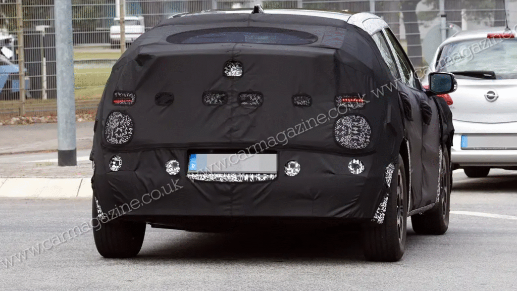 Spy shot of camouflaged Hyundai Ioniq 2 prototype testing in Europe