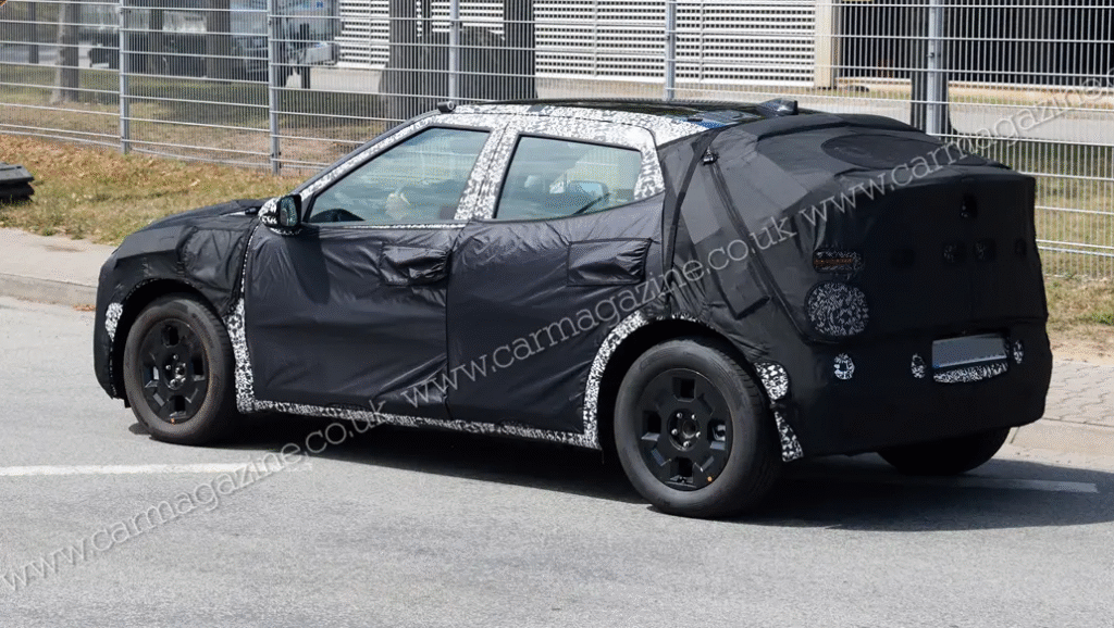 Spy shot of camouflaged Hyundai Ioniq 2 prototype testing in Europe