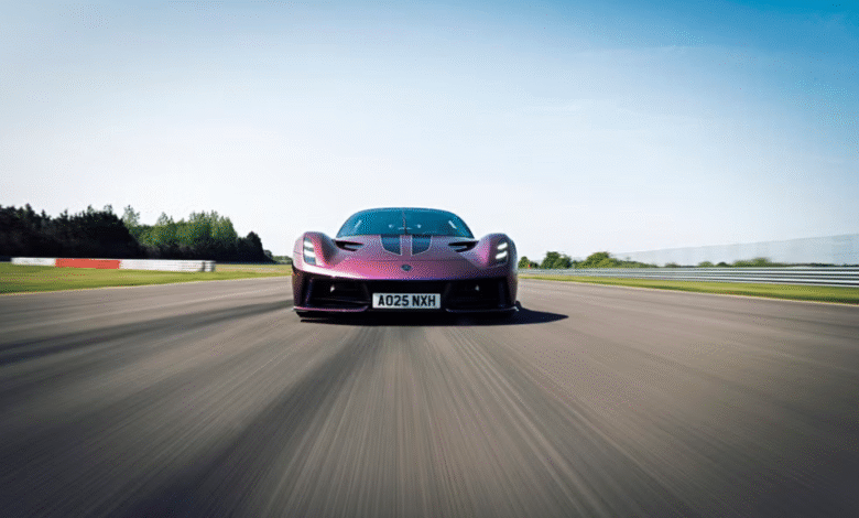 Lotus Evija electric hypercar in Violaceous paint shifting between purple and orange.