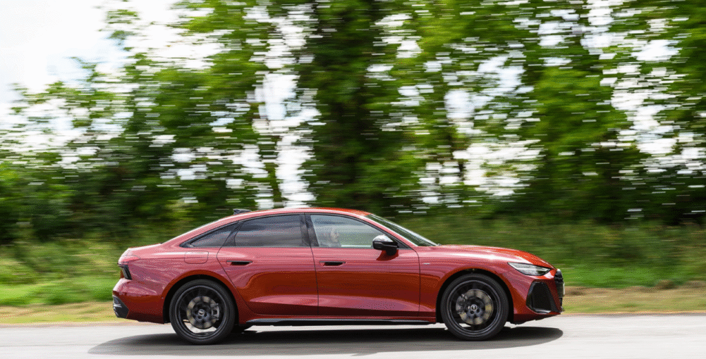 Audi A6 e-Hybrid driving on city streets in EV mode