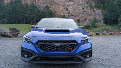 Front view of 2025 Subaru WRX tS in motion on a mountain road