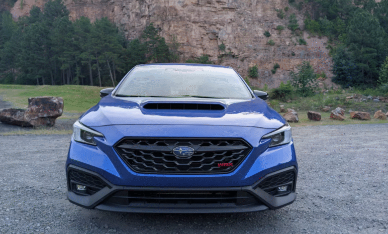 Front view of 2025 Subaru WRX tS in motion on a mountain road