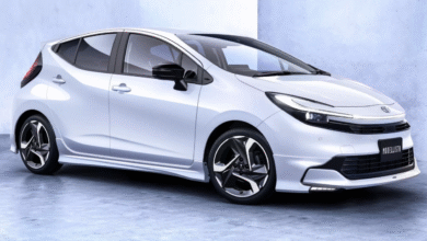 2025 Toyota Aqua facelift front view with new hammerhead headlights and LED bar