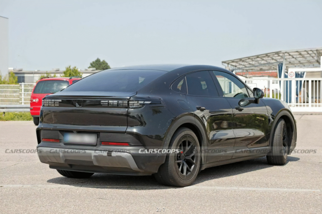 Rear profile of Porsche Cayenne EV Coupe with raked roofline and LED taillights