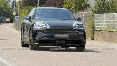 Porsche Cayenne EV Coupe prototype front view with sleek headlights and new grille