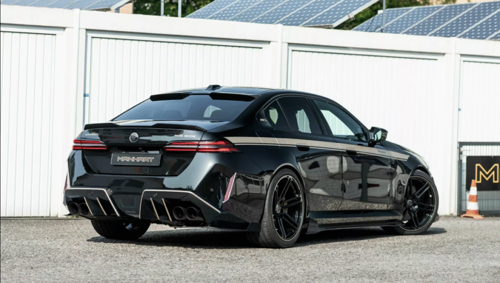 Close-up of BMW M5 Manhart carbon fiber rear diffuser and quad exhausts