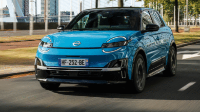 Front view of the 2025 Nissan Micra EV showcasing round headlights