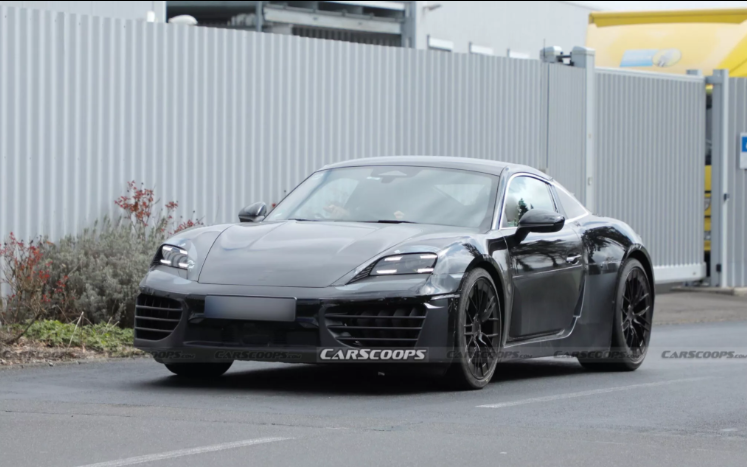 Porsche EV prototype during testing with camouflage wrap