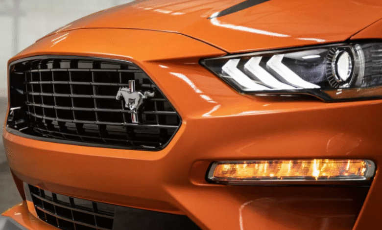 Ford Mustang overturned in ditch as spectators rush to help