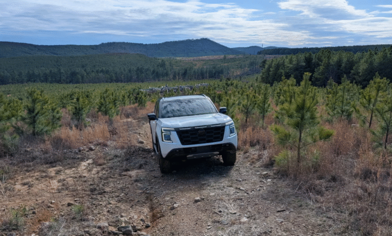 2025 Nissan Armada Pro-4X driving off-road in Ouachita Forest
