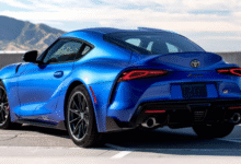 2025 Toyota Supra sports car on a racetrack during sunset