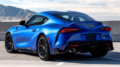 2025 Toyota Supra sports car on a racetrack during sunset