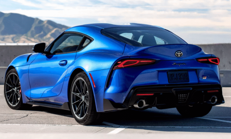2025 Toyota Supra sports car on a racetrack during sunset